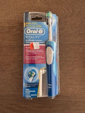 NEW ORAL- B VITALITY FLOSS ACTION RECHARGEABLE TOOTHBRUSH SEALED